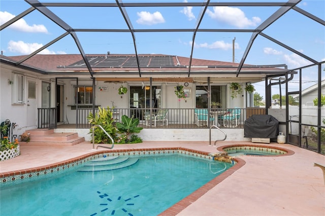 3301 Santa Barbara Dr, Punta Gorda, FL 33983 - back of property with a patio, stucco siding, roof with shingles, and a lanai