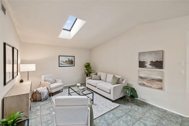 3301 Santa Barbara Dr, Punta Gorda, FL 33983 - living area featuring a skylight, lofted ceiling, and baseboards