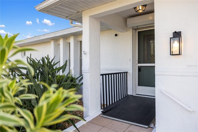 3301 Santa Barbara Dr, Punta Gorda, FL 33983 - entrance to property with stucco siding