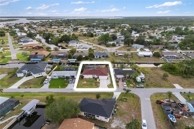 3301 Santa Barbara Dr, Punta Gorda, FL 33983 - aerial perspective of suburban area featuring a large body of water and property parcel outlined