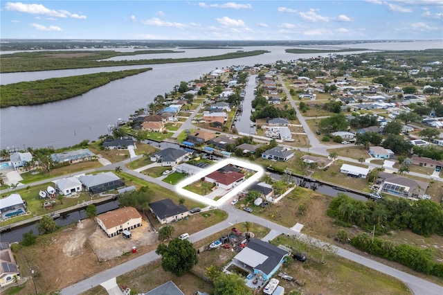 3301 Santa Barbara Dr, Punta Gorda, FL 33983 - aerial view of property and surrounding area with a nearby body of water, nearby suburban area, and property parcel outlined