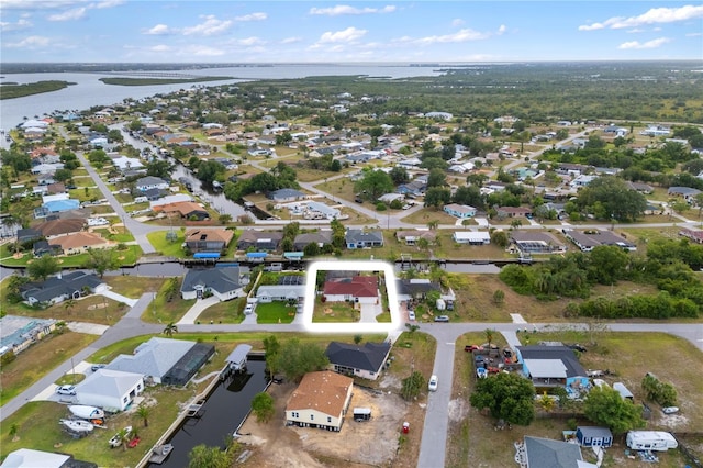 3301 Santa Barbara Dr, Punta Gorda, FL 33983 - view of property location with a large body of water, nearby suburban area, and property parcel outlined