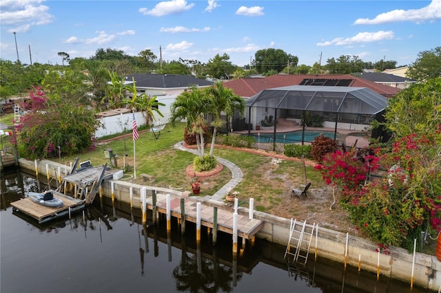 3301 Santa Barbara Dr, Punta Gorda, FL 33983 - dock with a water view, an outdoor pool, and a lanai