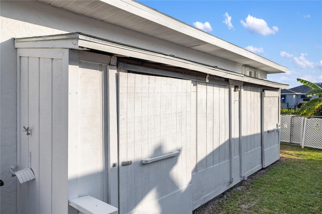 3301 Santa Barbara Dr, Punta Gorda, FL 33983 - view of side of home featuring an outdoor structure and a shed