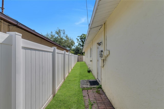 view of side of property featuring stucco siding
