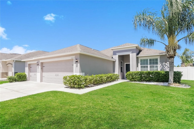 20067 Oakflower Ave, Tampa, FL 33647 - view of front of home with a garage, stucco siding, and driveway