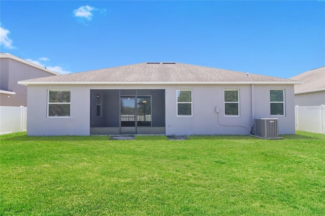 20067 Oakflower Ave, Tampa, FL 33647 - rear view of property featuring central AC unit, stucco siding, and roof with shingles
