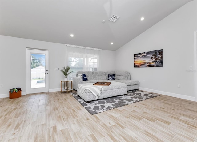 7664 Meroni Blvd, North Port, FL 34291 - bedroom with lofted ceiling, wood finished floors, baseboards, and recessed lighting