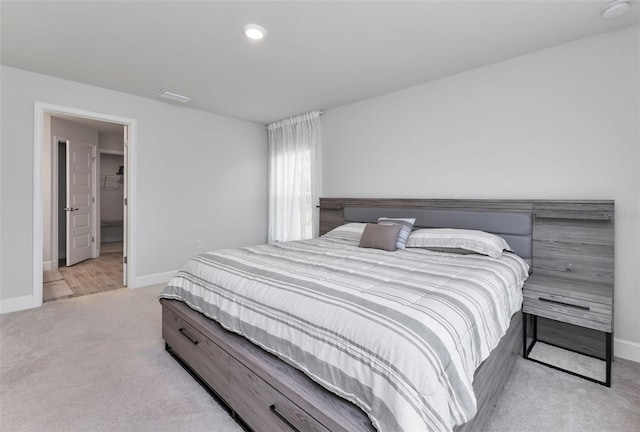 7664 Meroni Blvd, North Port, FL 34291 - bedroom featuring light colored carpet, baseboards, and recessed lighting