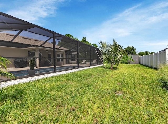 7664 Meroni Blvd, North Port, FL 34291 - view of yard with a lanai, ceiling fan, and a patio