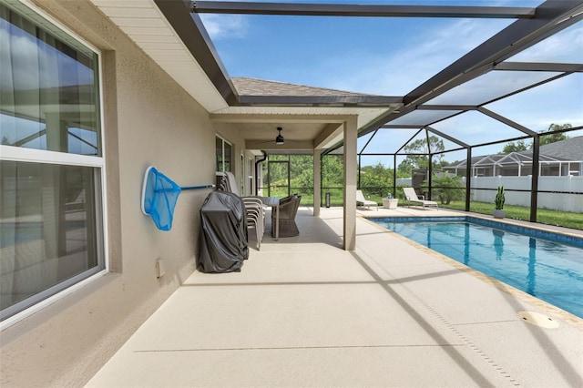 7664 Meroni Blvd, North Port, FL 34291 - view of pool featuring a patio area, glass enclosure, and ceiling fan