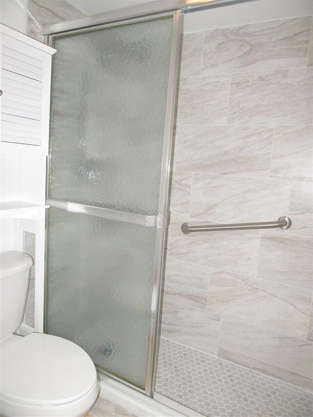 150 Harborside Ave Unit 124, Punta Gorda, FL 33950 - full bath featuring a shower stall and toilet