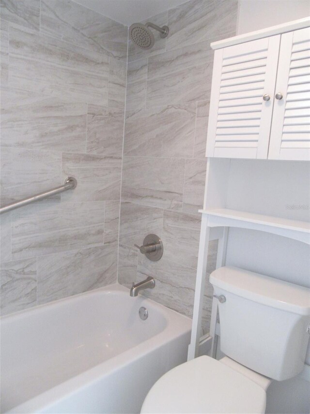 150 Harborside Ave Unit 124, Punta Gorda, FL 33950 - full bathroom featuring toilet and shower / washtub combination