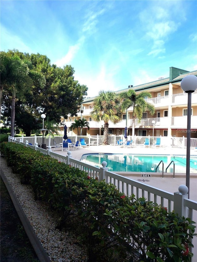 150 Harborside Ave Unit 124, Punta Gorda, FL 33950 - community pool with fence and a patio