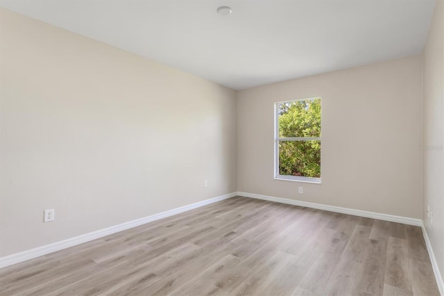 2381 Sheila Ln, North Port, FL 34286 - unfurnished room featuring light wood finished floors and baseboards