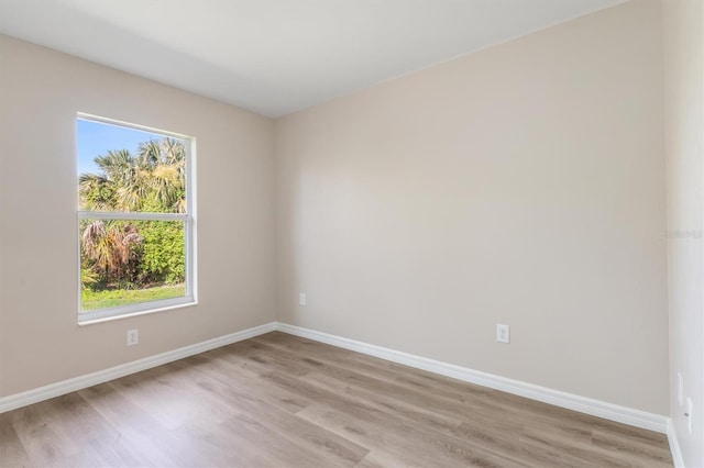 2381 Sheila Ln, North Port, FL 34286 - spare room with plenty of natural light, light wood-style flooring, and baseboards