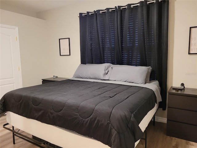 1271 Jonah Dr, North Port, FL 34289 - bedroom with wood finished floors and baseboards