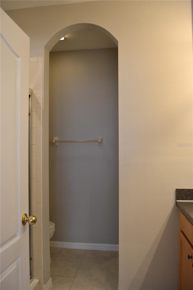 1271 Jonah Dr, North Port, FL 34289 - full bathroom featuring vanity, a shower with door, and tile patterned flooring