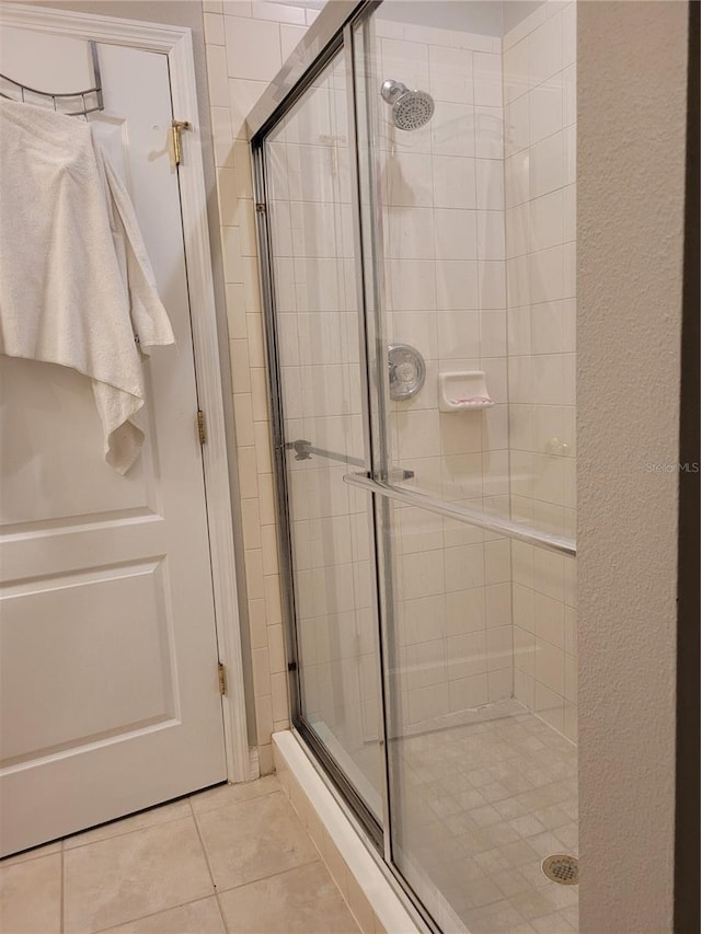 1271 Jonah Dr, North Port, FL 34289 - bathroom with a shower stall and tile patterned flooring