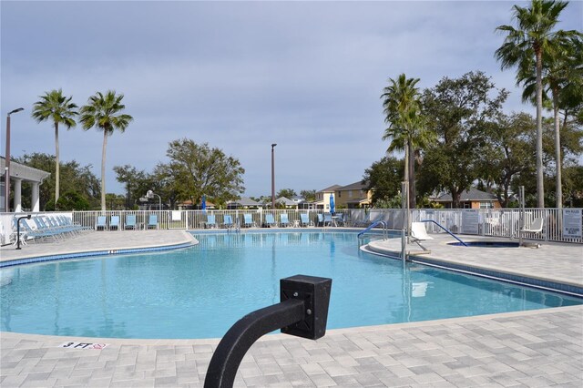 1271 Jonah Dr, North Port, FL 34289 - community pool featuring a patio area
