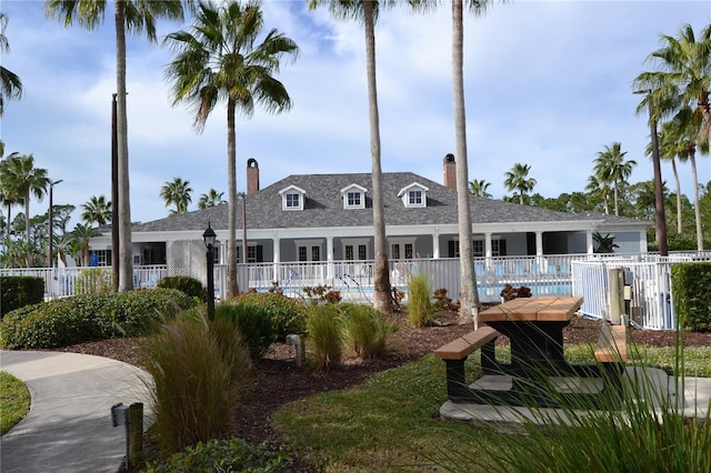 1271 Jonah Dr, North Port, FL 34289 - view of building exterior featuring a community pool