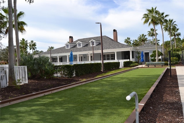 1271 Jonah Dr, North Port, FL 34289 - back of house with a chimney