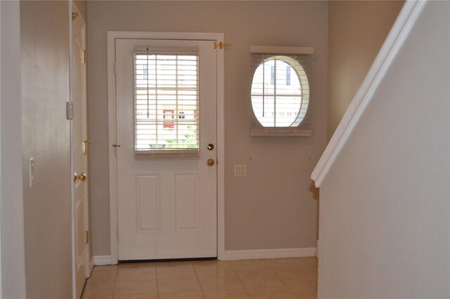 1271 Jonah Dr, North Port, FL 34289 - entryway with baseboards and light tile patterned floors