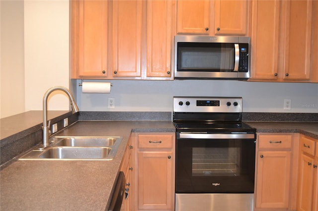 1271 Jonah Dr, North Port, FL 34289 - kitchen with stainless steel appliances and dark countertops