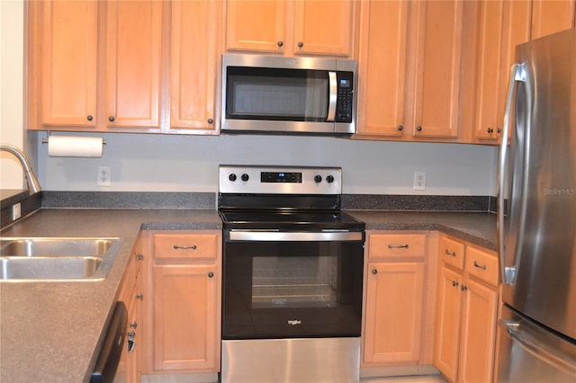 1271 Jonah Dr, North Port, FL 34289 - kitchen featuring appliances with stainless steel finishes and dark countertops