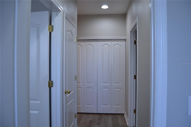 1271 Jonah Dr, North Port, FL 34289 - hallway featuring dark wood-type flooring and recessed lighting
