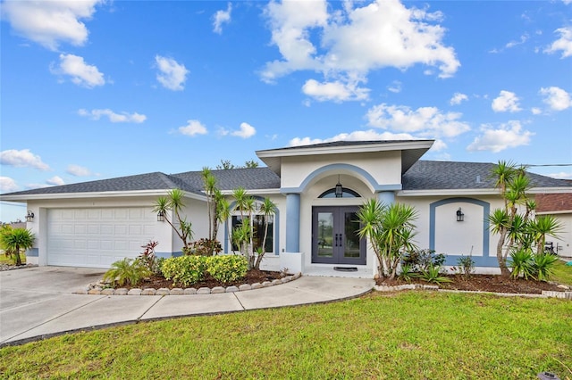 1 Sportsman Way, Rotonda West, FL 33947 - ranch-style home featuring french doors, stucco siding, an attached garage, and a front lawn