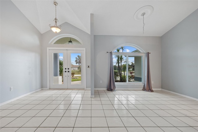 1 Sportsman Way, Rotonda West, FL 33947 - foyer featuring light tile patterned floors, french doors, vaulted ceiling, and baseboards