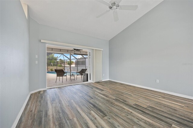 1 Sportsman Way, Rotonda West, FL 33947 - unfurnished room featuring a sunroom, high vaulted ceiling, a ceiling fan, wood finished floors, and baseboards