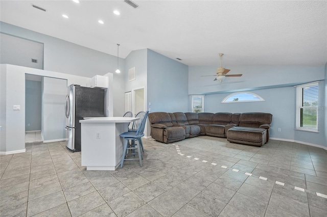 1 Sportsman Way, Rotonda West, FL 33947 - living area with a ceiling fan, light tile patterned flooring, high vaulted ceiling, baseboards, and recessed lighting