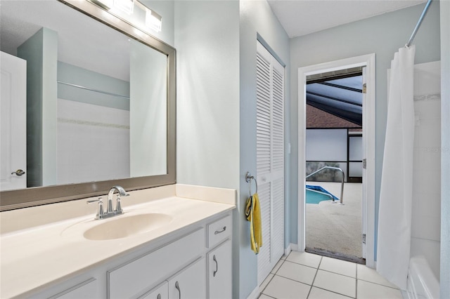 1 Sportsman Way, Rotonda West, FL 33947 - full bathroom with tile patterned flooring, vanity, and curtained shower