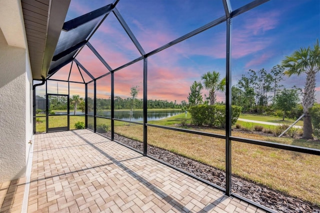 281 Potenza Loop, Nokomis, FL 34275 - unfurnished sunroom with a water view and view of wooded area