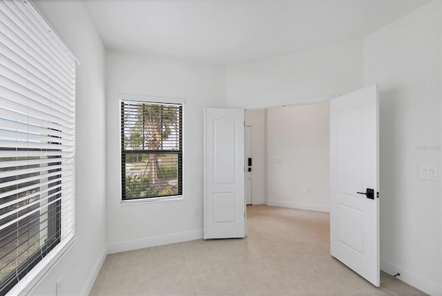 281 Potenza Loop, Nokomis, FL 34275 - unfurnished room with light tile patterned flooring and baseboards