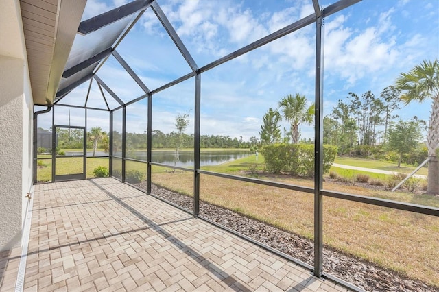 281 Potenza Loop, Nokomis, FL 34275 - unfurnished sunroom with a water view and view of wooded area