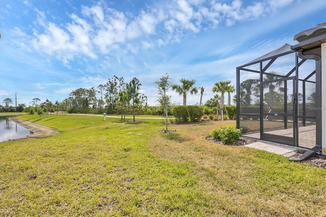 281 Potenza Loop, Nokomis, FL 34275 - view of grassy yard with a lanai and a water view