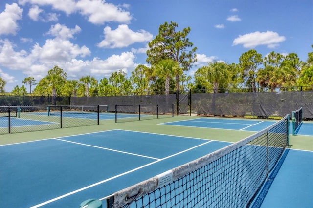 281 Potenza Loop, Nokomis, FL 34275 - view of tennis court featuring fence and community basketball court