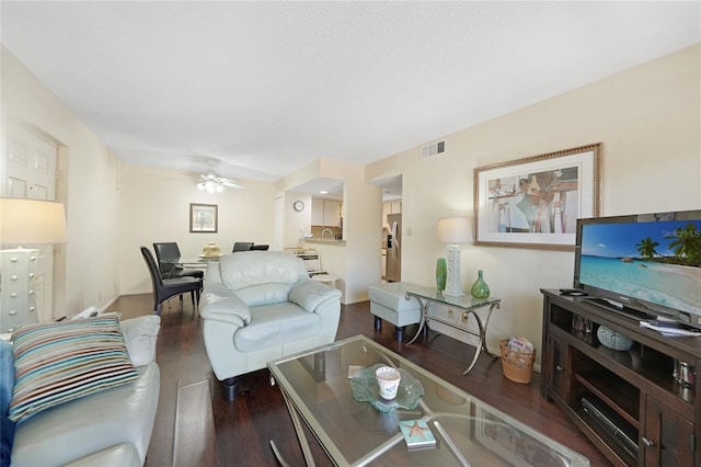 19505 Quesada Ave Unit M104, Port Charlotte, FL 33948 - living room featuring wood finished floors and a ceiling fan