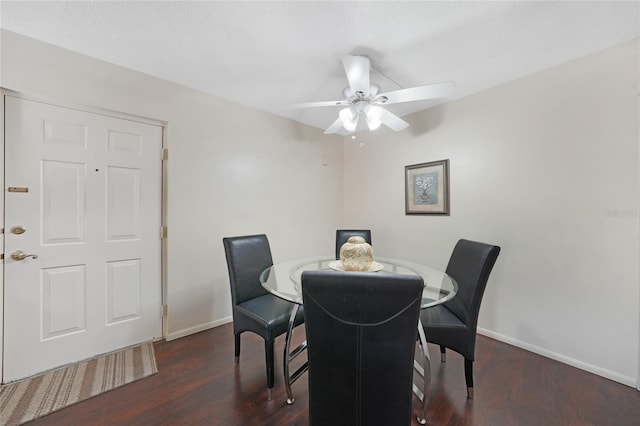 19505 Quesada Ave Unit M104, Port Charlotte, FL 33948 - dining room featuring baseboards, wood finished floors, and ceiling fan