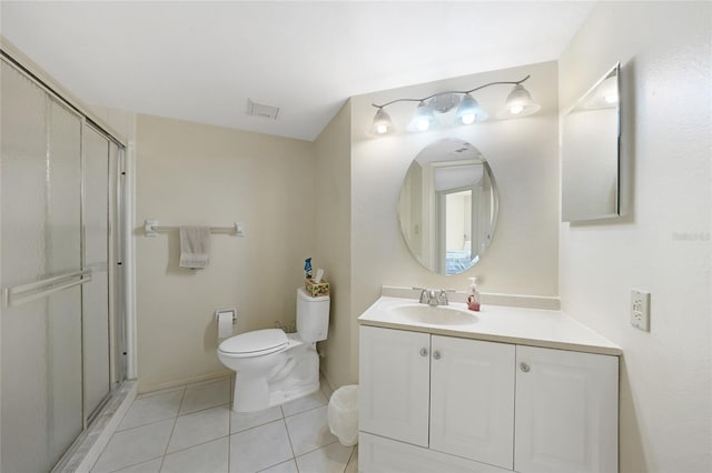 19505 Quesada Ave Unit M104, Port Charlotte, FL 33948 - full bathroom featuring tile patterned flooring, toilet, a stall shower, vanity, and baseboards
