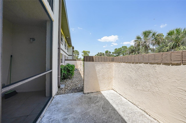 19505 Quesada Ave Unit M104, Port Charlotte, FL 33948 - view of patio / terrace with fence