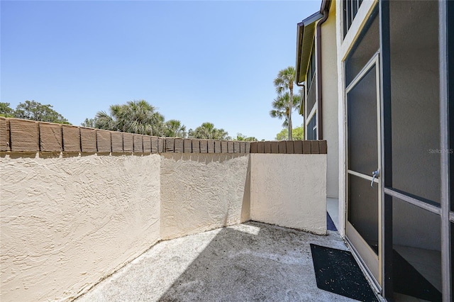 19505 Quesada Ave Unit M104, Port Charlotte, FL 33948 - view of patio / terrace featuring fence
