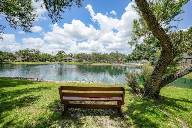 19505 Quesada Ave Unit M104, Port Charlotte, FL 33948 - surrounding community featuring a water view and a lawn