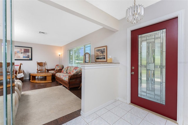 2008 Pellam Blvd, Port Charlotte, FL 33948 - entryway featuring a chandelier and baseboards