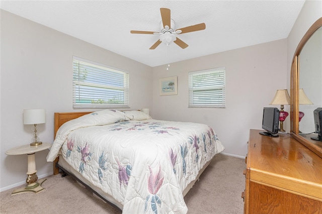 2008 Pellam Blvd, Port Charlotte, FL 33948 - bedroom featuring light carpet, baseboards, and ceiling fan