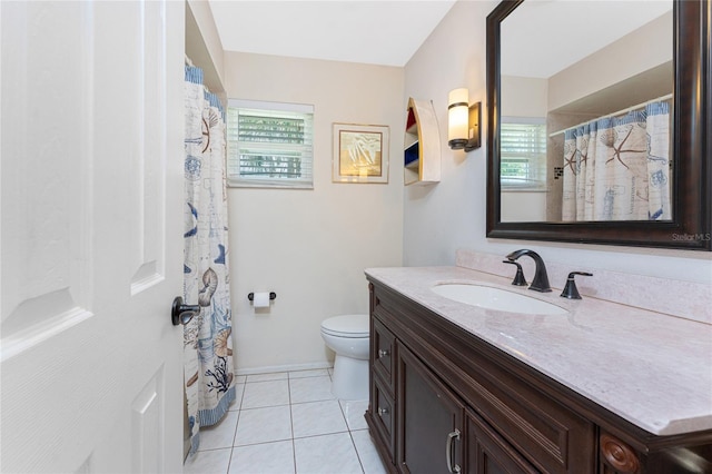 2008 Pellam Blvd, Port Charlotte, FL 33948 - bathroom featuring toilet, tile patterned flooring, vanity, and baseboards