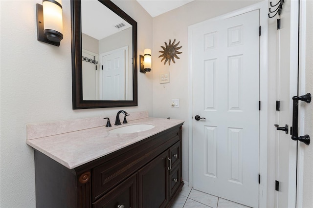 2008 Pellam Blvd, Port Charlotte, FL 33948 - bathroom with tile patterned floors and vanity